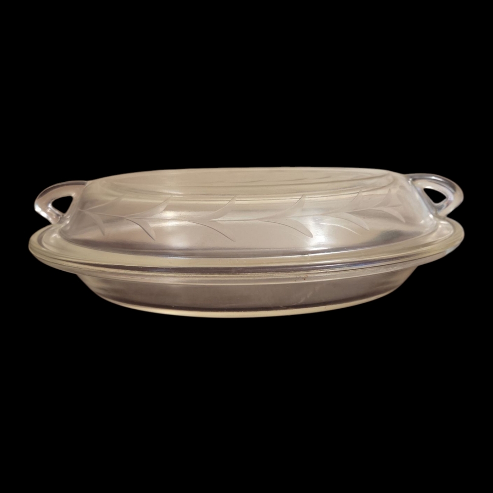 $Pyrex$ 100 year old Embossed Glassware Dish